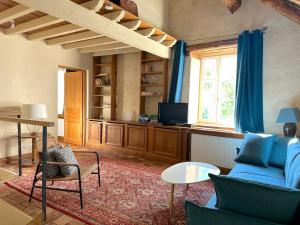 Ruang duduk di Clos de Fougères - Chambres d'hôtes