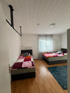 Ένα ή περισσότερα κρεβάτια σε δωμάτιο στο WAT Wohnung GR
