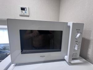 Μια τηλεόραση ή/και κέντρο ψυχαγωγίας στο 遇見民宿 +8 φωτογραφίες