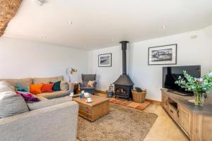 TV a/nebo společenská místnost v ubytování Nichols Barn