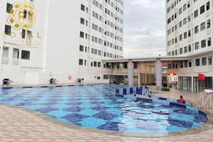 Bazén v ubytování Royal Suites Studio 15QR - Baloi Apartment nebo v jeho okolí