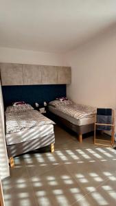 Una cama o camas en una habitación de Studio U Karolíny
