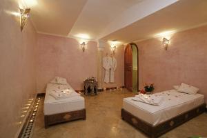 Postel nebo postele na pokoji v ubytování Riad & Spa Esprit Du Maroc