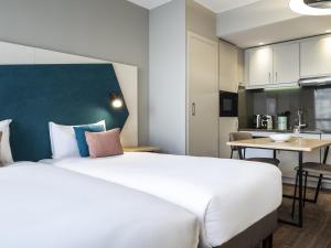 Köök või kööginurk majutusasutuses Aparthotel Adagio Paris Nation