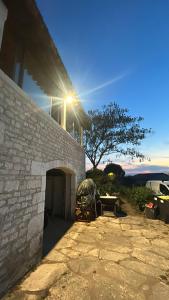 a stone building with a light on top of it at Bellevue in Montpezat-de-Quercy