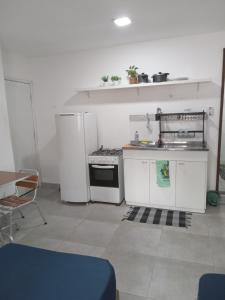 Køkken eller tekøkken på Kitnet 203