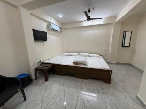 Ένα ή περισσότερα κρεβάτια σε δωμάτιο στο HPS Residency