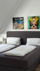 Postel nebo postele na pokoji v ubytování Exklusive Maisonette-Wohnung am Rande von Freiburg im Breisgau