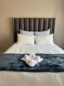 Ένα ή περισσότερα κρεβάτια σε δωμάτιο στο Penthouse On Tropical - The Blyde +32 φωτογραφίες