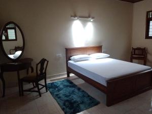 Katil atau katil-katil dalam bilik di Amara Garden Villa