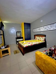 Ένα ή περισσότερα κρεβάτια σε δωμάτιο στο Les résidences Jacky