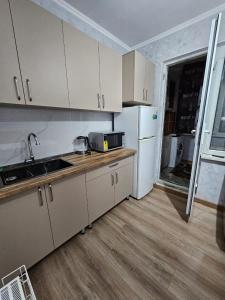 Kuchyň nebo kuchyňský kout v ubytování Lumi