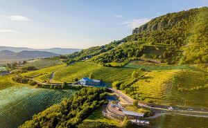 an aerial view of a farm on a hill at Malomfészek Apartman in Tapolca