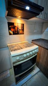 Kuchyň nebo kuchyňský kout v ubytování Fly & Stay Bogota APT 1