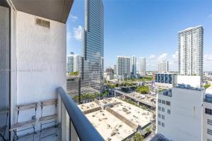 a balcony with a view of a city skyline at Luxury Loft 270 views Rooftop Pool Parking in Miami