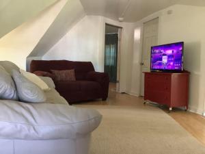 Χώρος καθιστικού στο Lovely PR near Lourdes Hospital by Binghamton