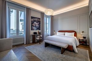 Ένα ή περισσότερα κρεβάτια σε δωμάτιο στο Dimora Collection - Le Logge - Historic Boutique Luxury Suites +77 φωτογραφίες