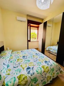Postel nebo postele na pokoji v ubytování La casa di Tommaso