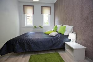 Posteľ alebo postele v izbe v ubytovaní Cozy Apartment