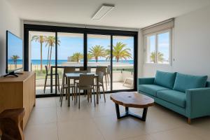 TV a/nebo společenská místnost v ubytování Apartamentos Picnic