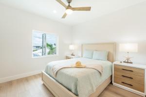 En eller flere senge i et værelse på Sun Kissed Villa by Sun Palace Vacations + 53 billeder