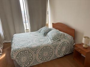 Кровать или кровати в номере Alojamiento Talca centro