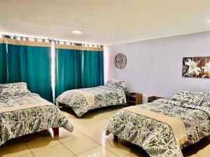 Postel nebo postele na pokoji v ubytování Hotel Khantati