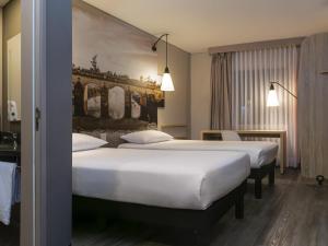 Postel nebo postele na pokoji v ubytování ibis Chia + 126 fotografií