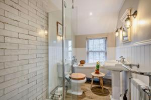 Et badeværelse på Postmans Cottage