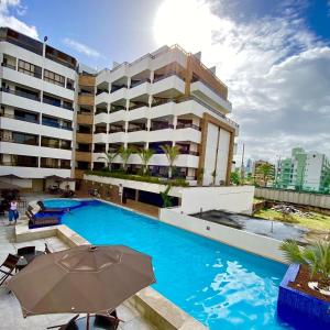Bazén v ubytování Gold Flat com Café by Apartamentos Jampa nebo v jeho okolí