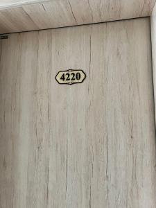 a door with the number on it at Kigali Phoenix Serviced Apartments in Kigali