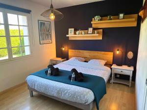 Postel nebo postele na pokoji v ubytování Maison Villa Sables-d'Olonne