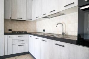 Η κουζίνα ή μικρή κουζίνα στο Mira Venice Apartment