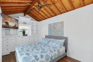 Ένα ή περισσότερα κρεβάτια σε δωμάτιο στο House Village location Beach,Food,Surf,AC,Parking