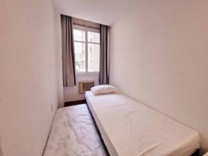 Katil atau katil-katil dalam bilik di SUH Copacabana 19 Spacious Near The Beach! +15 gambar