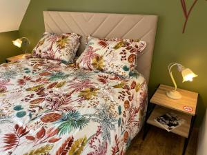 Ένα ή περισσότερα κρεβάτια σε δωμάτιο στο Chez L'Aviateur