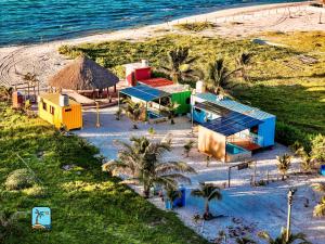 an aerial view of a house on the beach at Hotel Playa Los Angeles Bungalow Aloha in Ciudad del Carmen
