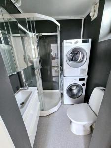 Ένα μπάνιο στο Studio apartment in the centre