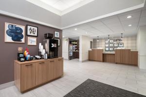 a lobby of a store with a coffee shop at Garner Hotel Wytheville East by IHG in Wytheville +34 photos