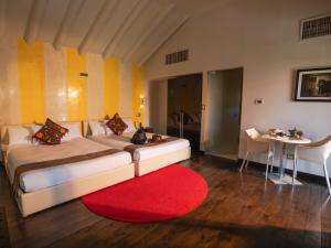 Postel nebo postele na pokoji v ubytování Casa Cartagena Boutique Hotel & Spa + 49 fotografií