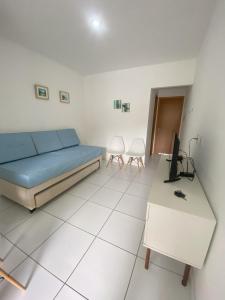 Televisyen dan/atau pusat hiburan di Flat superior no Monte Castelo Condomínio