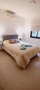 En eller flere senge i et værelse på Menta y Limon