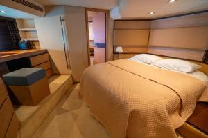 a bedroom with a large bed in a room at Azimut 58 in Panama City