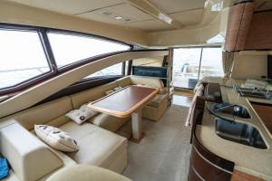 a view of the back of a boat with a table at Azimut 58 in Panama City