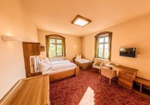 Postel nebo postele na pokoji v ubytování Hotel Freyhof