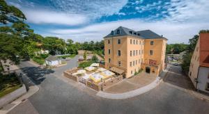 an overhead view of a building in a city at Hotel Freyhof in Freiberg