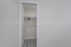 a room with a closet with a glass door at PALO ALTO MASTER with private bathroom and private entry , near Stanford in East Palo Alto +3 photos