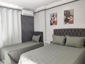 Χώρος καθιστικού στο Gran Palazzo Pajuçara - Apartamento 04 quartos beira mar!