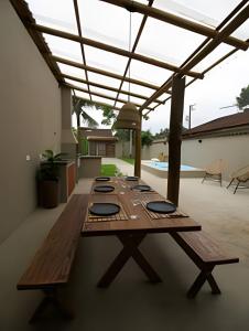 Πισίνα στο ή κοντά στο Casa com piscina privativa, 4 minutos da praia