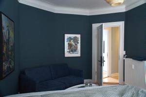 Postel nebo postele na pokoji v ubytování Blue Brook Lounges